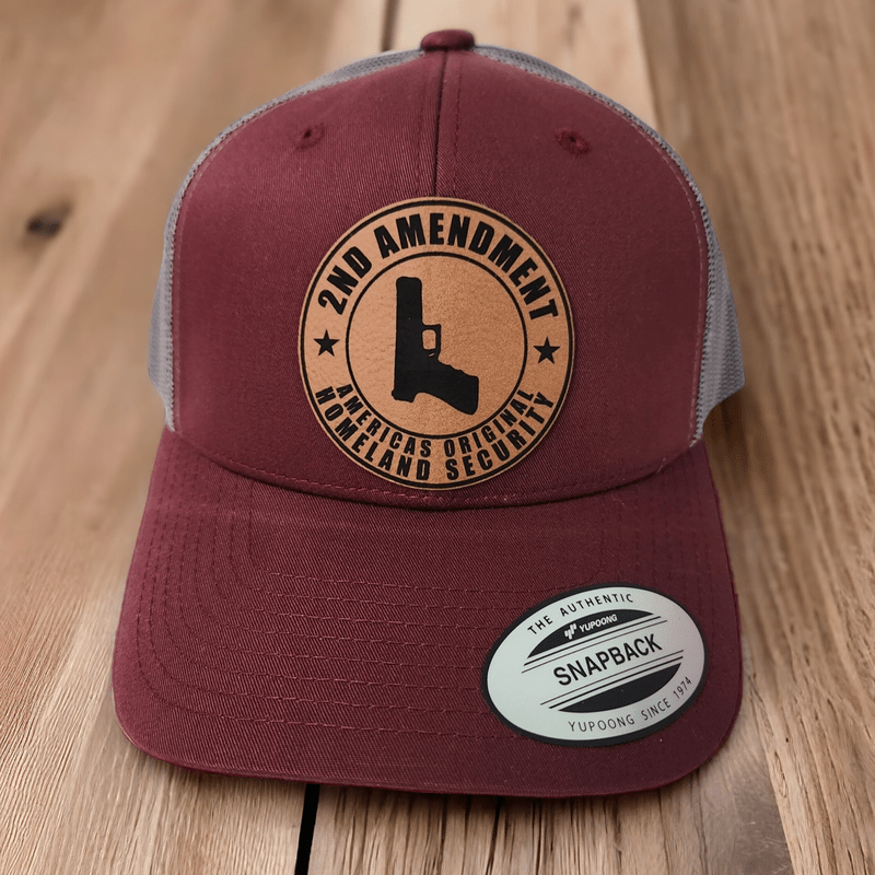 2nd Amendment: America's Original Homeland Security Leather Patch Trucker Hat - Trucker Hat - Charm and Char