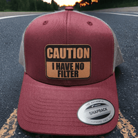 Thumbnail for Caution: I Have No Filter Leather Patch Trucker Hat - Trucker Hat - Charm and Char