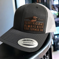 Thumbnail for Electricians Always Keep you Turned On Leather Patch Trucker Hat for Electricians - Trucker Hat - Charm and Char