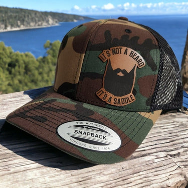 It's not a Beard It's a Saddle Leather Patch Trucker Hat for Beard Enthusiasts - Trucker Hat - Charm and Char