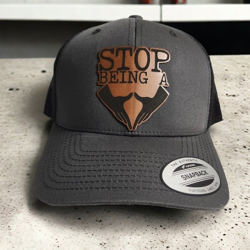 Stop Being a Pussy (Hand Gesture) Leather Patch Trucker Hat - Trucker Hat - Charm and Char