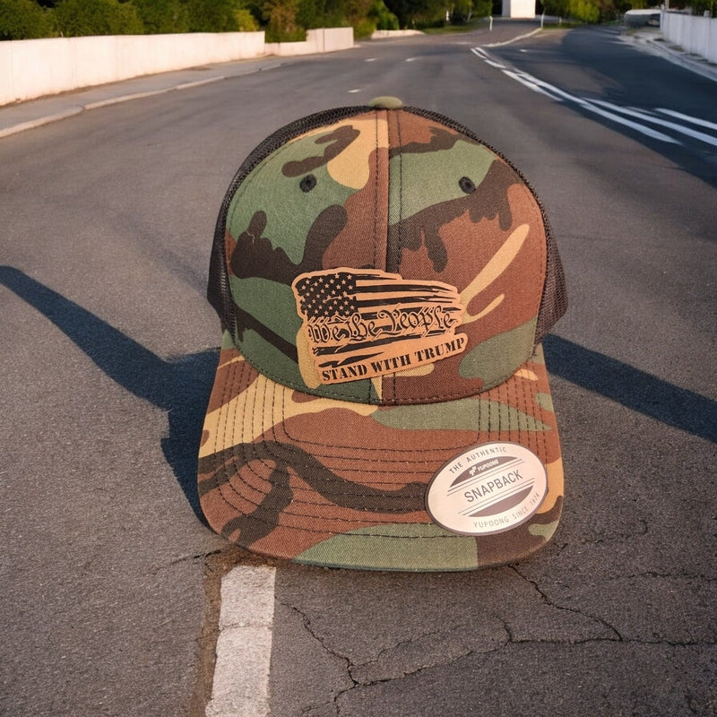 We the People Stand with Trump Leather Patch Trucker Hat Camo