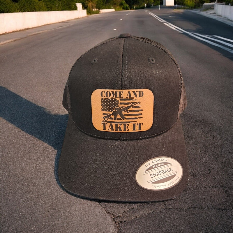 Come and Take It American Flag AR Leather Patch Trucker Hat Black