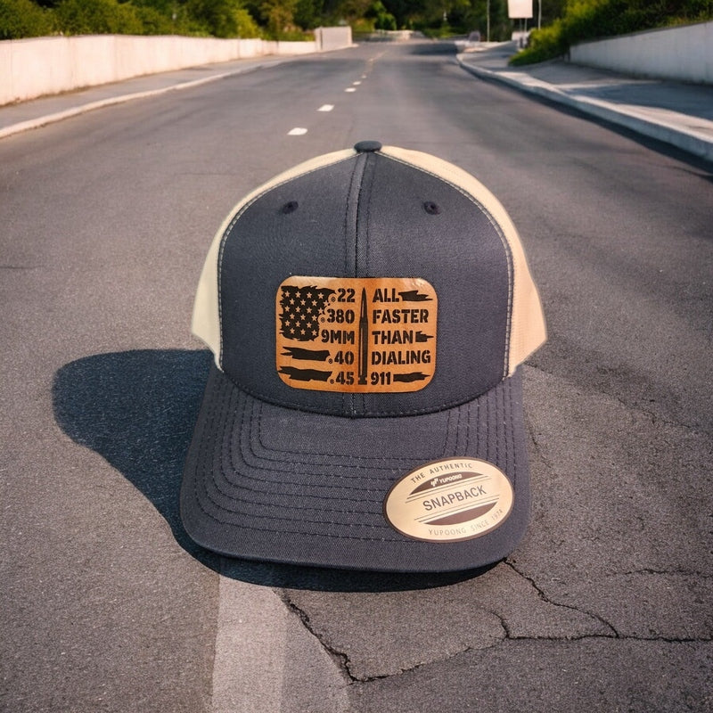 All Faster Than Dialing 911 Ammunition & American Flag Leather Patch Trucker Hat Navy/White