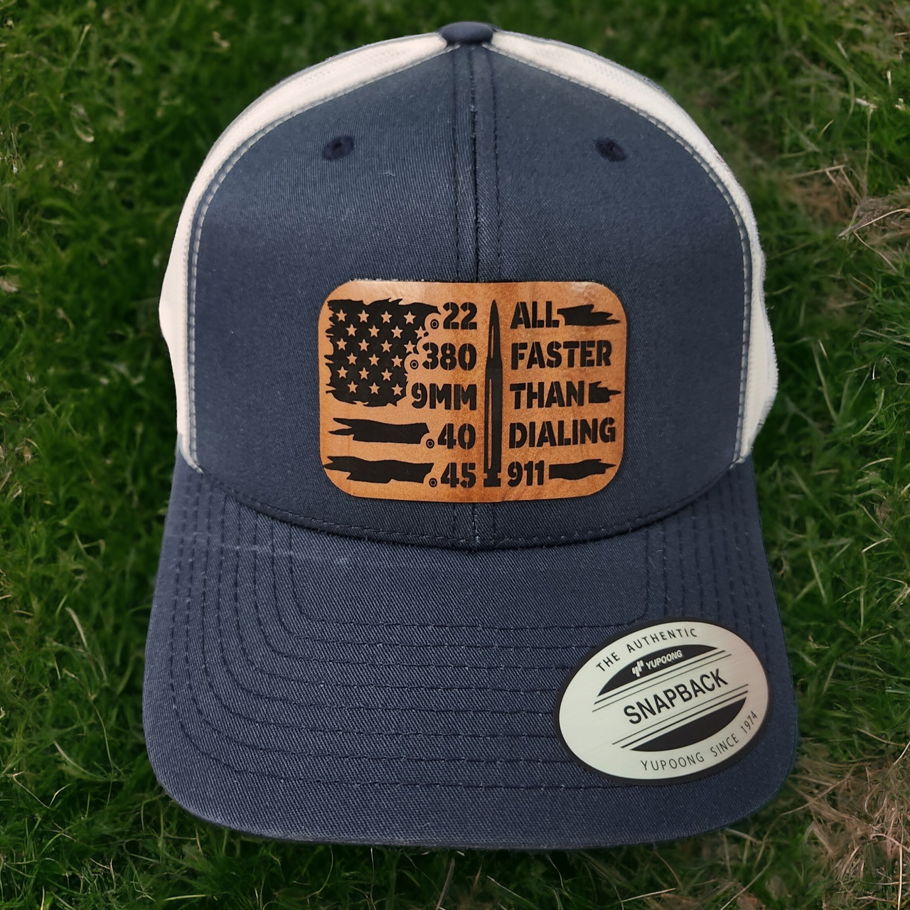 All Faster Than Dialing 911 Ammunition & American Flag Leather Patch Trucker Hat
