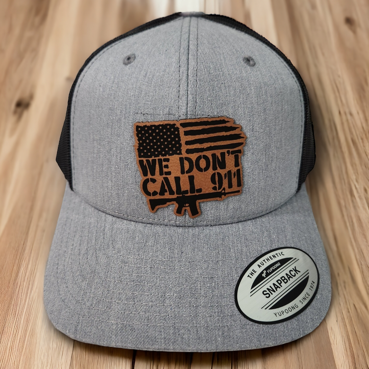We Don't Call 911 AR & American Flag Leather Patch Trucker Hat