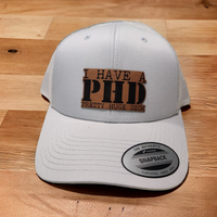 Thumbnail for I Have a PhD (Pretty Huge Dick) Leather Patch Trucker Hat
