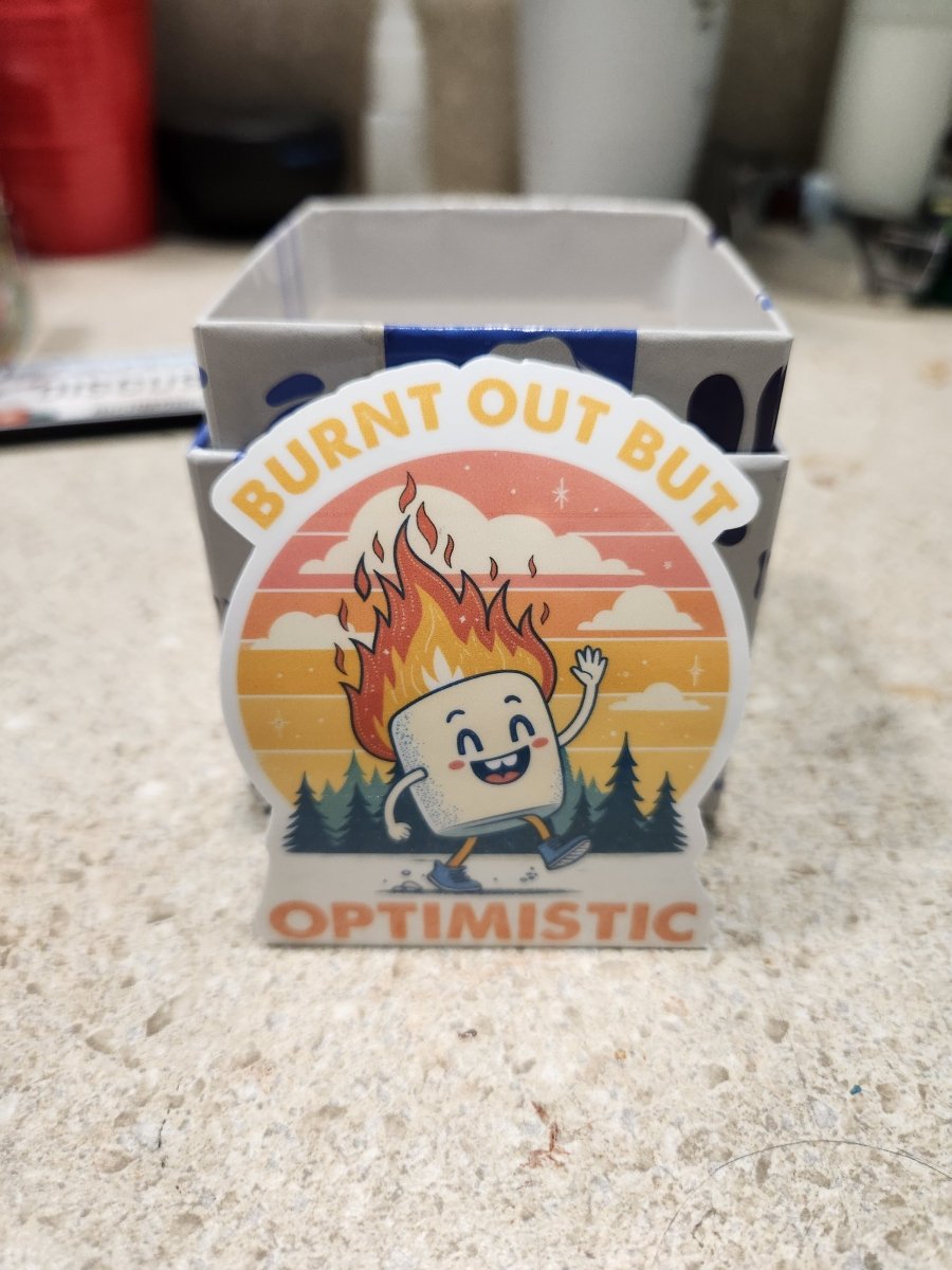 Burnt Out But Optimistic Sticker – Funny Campfire Marshmallow - Sticker - Charm and Char