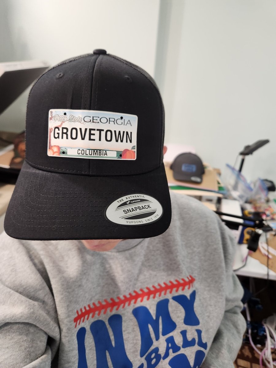 Disgusta GA License Plate Hat – Love It or Leave It - Trucker Hat - Charm and Char