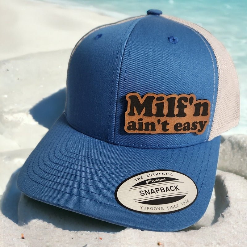 MILF'N Ain't Easy Leather Patch Trucker Hat - Trucker Hat - Charm and Char